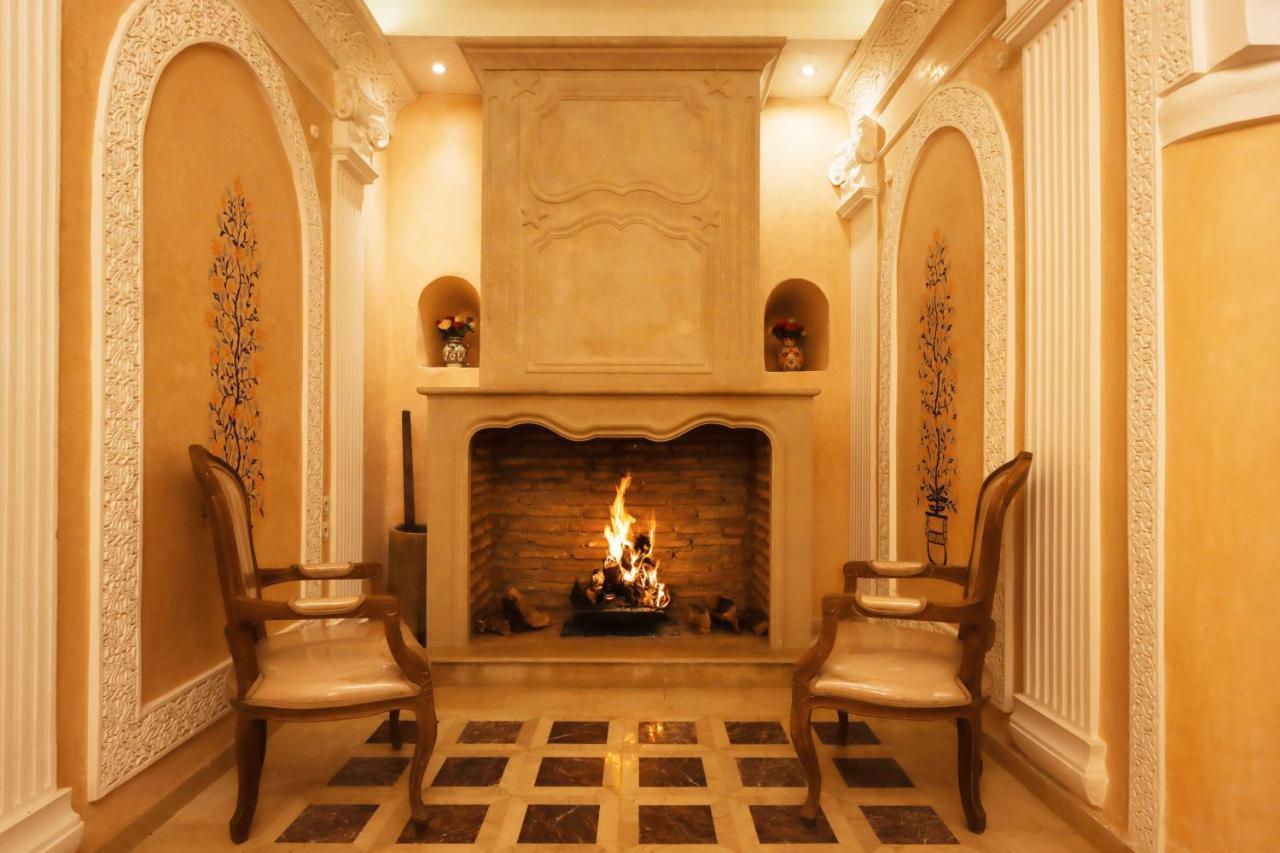 Riad Palais Des Princesses & Spa Marrakesh Exterior foto A fireplace in a home