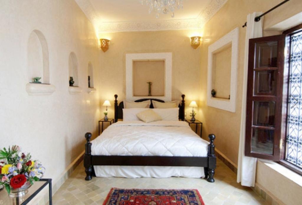 Riad Palais Des Princesses & Spa Marrakesh Habitación foto A bedroom in the hotel