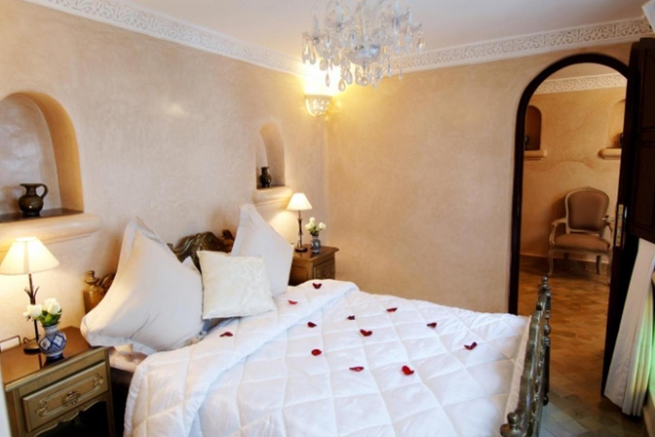 Riad Palais Des Princesses & Spa Marrakesh Habitación foto A bedroom at the hotel